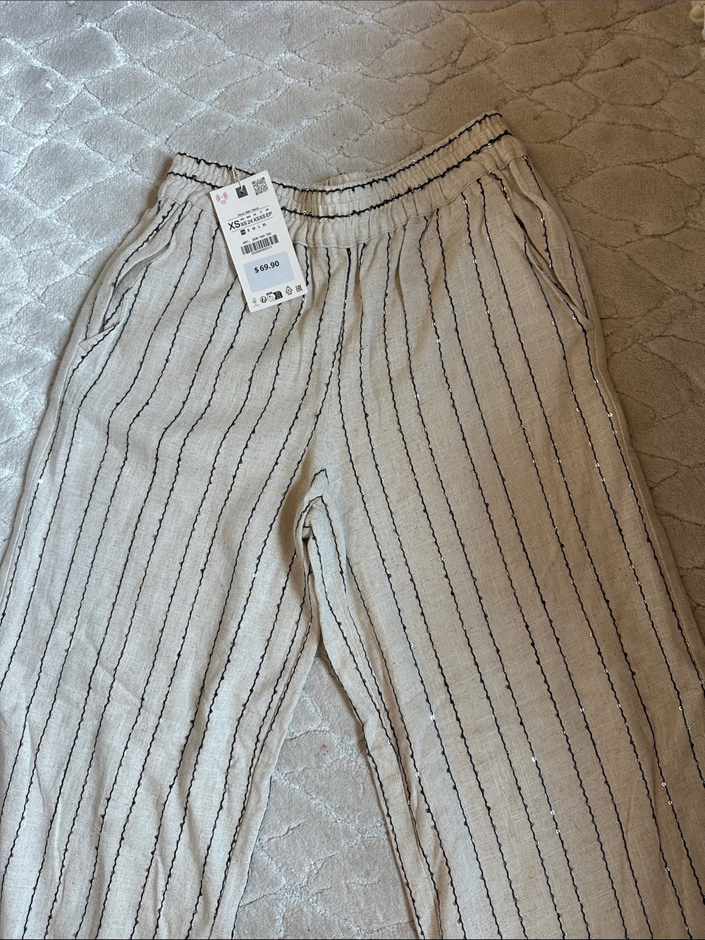 Zara lightweight beige linen pant with black stripe and sequence throughout
